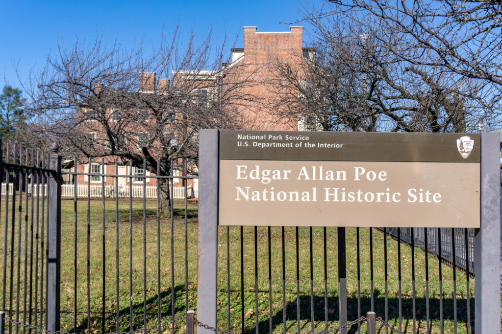 The National Park Service sign at the Edgar Allan Poe National Historic Site.