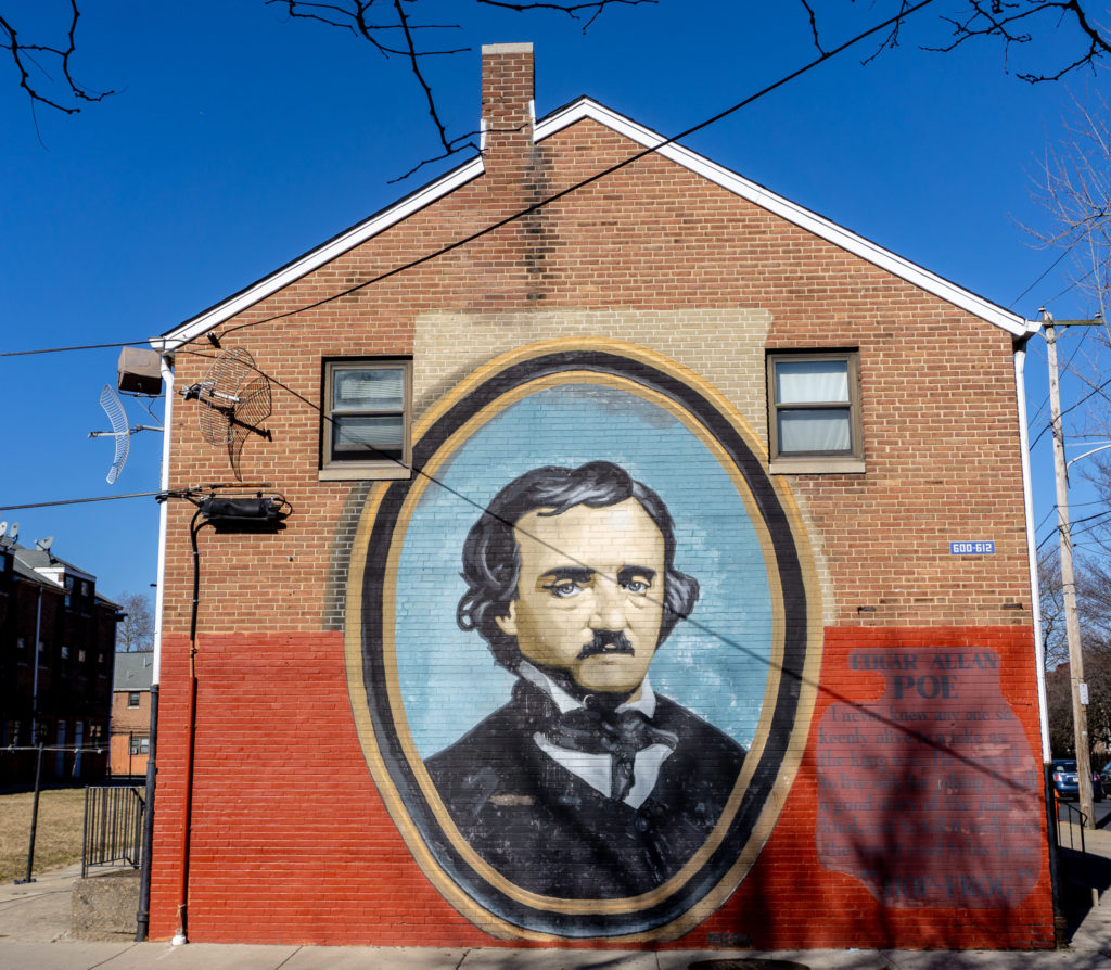 Mural of Edgar Allan Poe on the side of a building in Philadelphia.