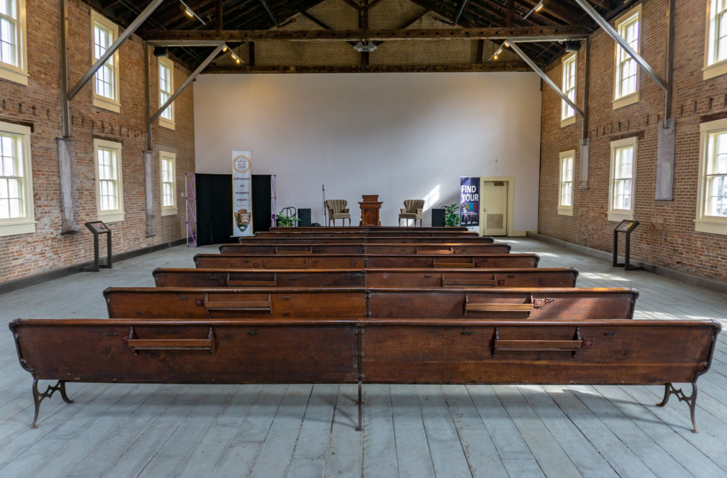 Interior of the Wesleyan Methodist Church with its church pews – part of the Women's Rights National Historical Park.